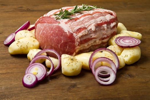 fresh roast of veal with rosemary and  potatoes