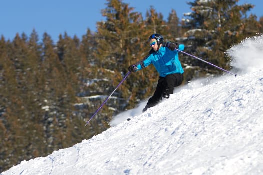 Skiers carving