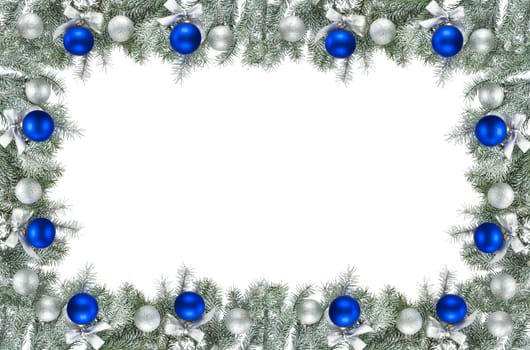 christmas frame made from pine branch and ornaments on white