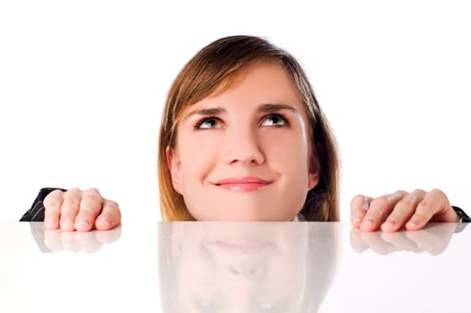 young business woman looking up on white