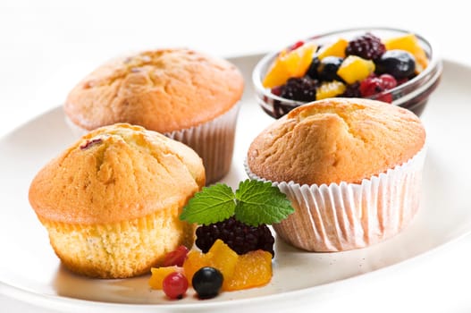 Freshly baked yellow muffins close up shoot