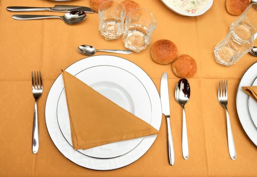 bread on the table with yellow tablecloth