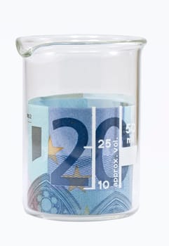 Twenty euro banknote in white beaker Isolated on white background