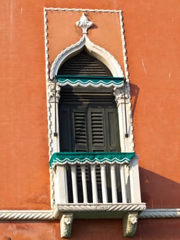 ancient balcony on the orange villa in Venice