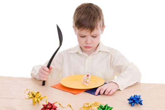 child with a large spoon isolated on white background