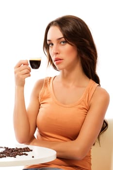 Elegant young woman with a cup of espresso coffee against white background