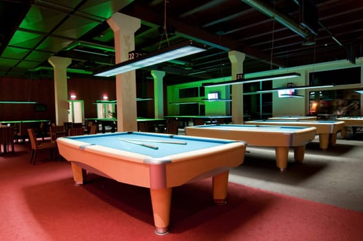 Shot of billiard room with tables, interior