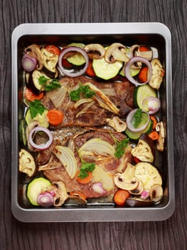 Tasty roasted pork meat with mushrooms and vegetable