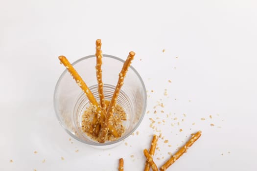 The last remaining pretzel sticks in the jar