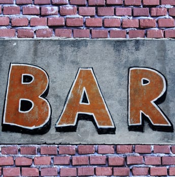 Old wall with the word bar