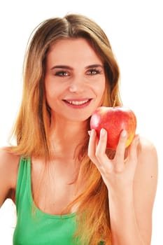 Young beautiful woman holding a red ripe apple in her hand