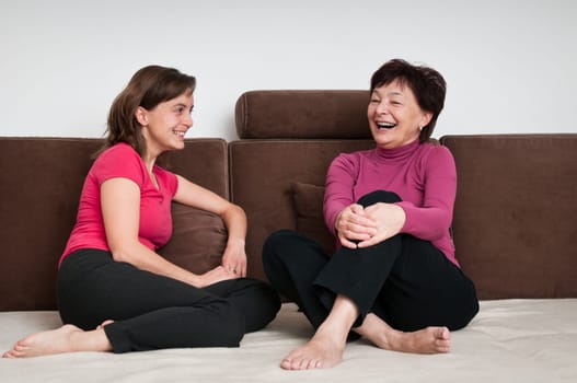 Mother and daughter together at home