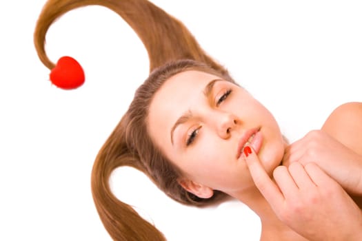 Young teen girl, red heart toy isolated on white