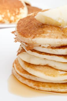 Homemade Pancakes With Butter and Warm Maple Syrup