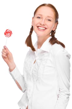 Studio shot of a young woman with a lollipop