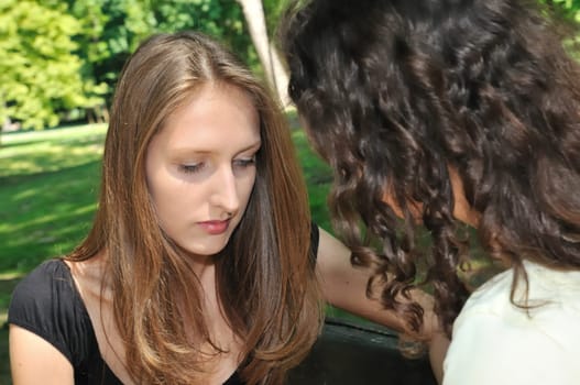 Friends series - one teenage girl comforts another which has serious problem