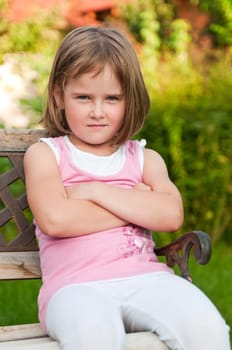 Outdoors portrait of small cute child -natural expression