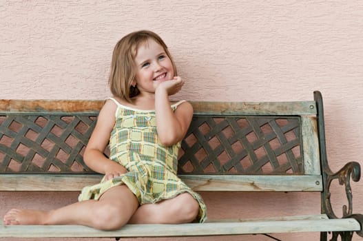 Outdoors portrait of small cute child - natural smiling expression