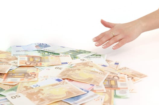 Hand reaching money - white background