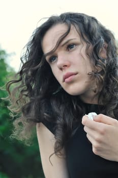 Young person (teenage girl) depressed in sad mood