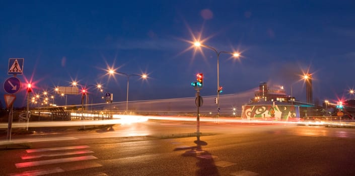 Stoplights in a crossing at night