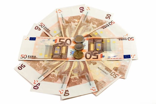 Money lies on a circle on a white background