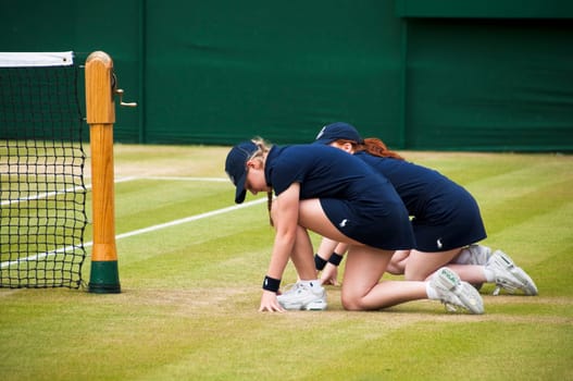 Two ball girls during the Wimbledon Championships