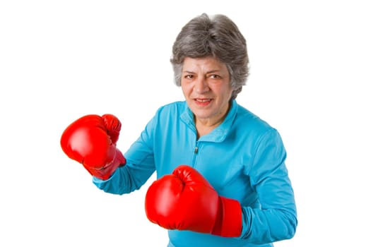 Senior woman with boxing gloves - isolated on white background