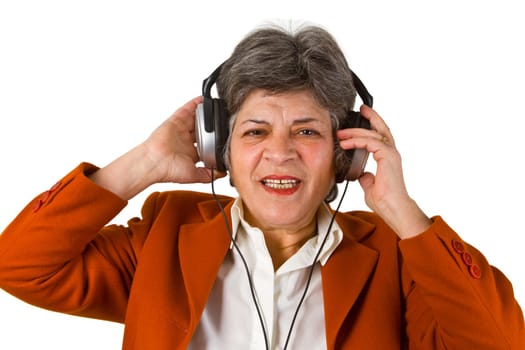 Senior woman with headphones - isolated on white background