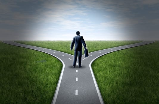 Business man at a cross roads standing at a horizon with grass and blue sky showing a fork in the road representing the concept of a strategic dilemma choosing the right direction to go when facing two equal or similar options.