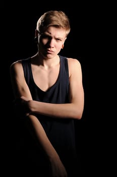 portrait of a teenager on darken background