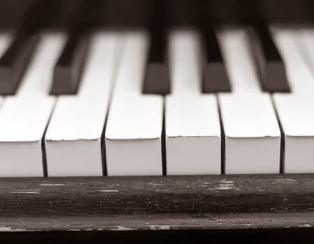 Close up of a worn piano