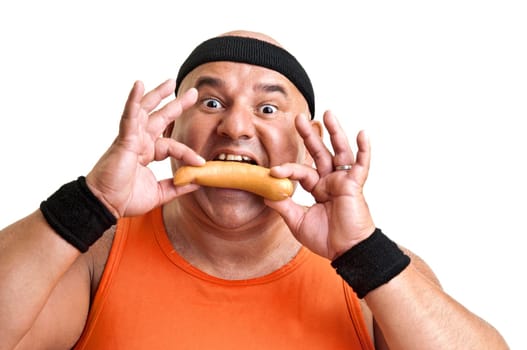 Large "fitness"" man with a big sausage isolated in white"