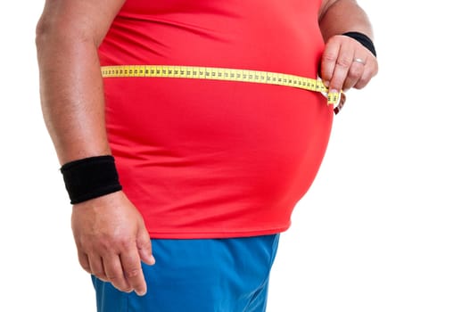 Large fitness man with measuring tape isolated in white