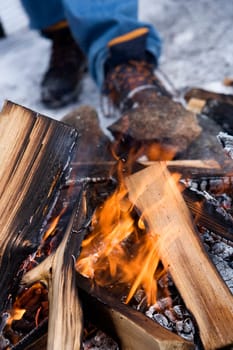Campfire with selective focus in the winter