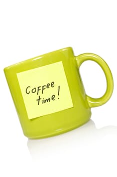 green cup with a yellow note "coffee time!""."