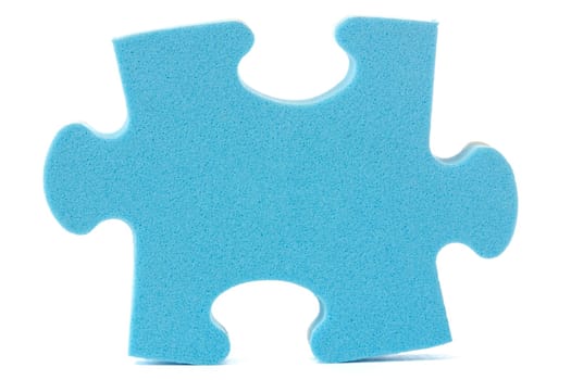 blue puzzle piece over a white background