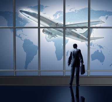 Business traveling international represented by an airplane airport departure waiting at the terminal lounge represented by a businessman standing with a breifcase in front of large glass windows looking at a global map of the world.