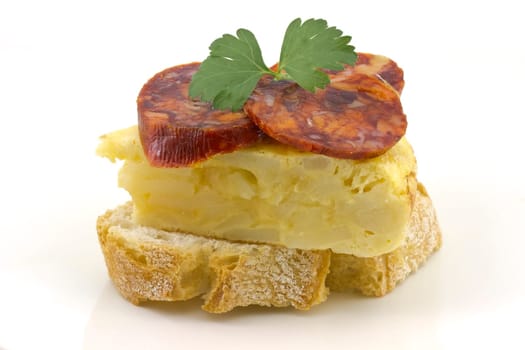 Spanish omelette with chorizo ??Iberico, typical cover montadito