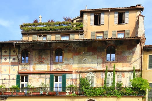 Picturesque house façade at Piazza delle Erbe,Verona,Italy