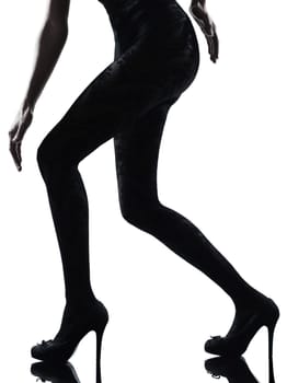 one woman legs silhouette on studio isolated white background