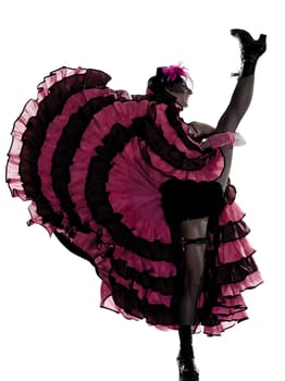 woman dancer dancing french cancan in studio isolated on white background