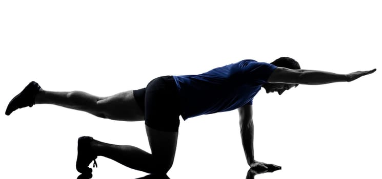 man exercising workout fitness aerobics posture in silhouette studio isolated on white background