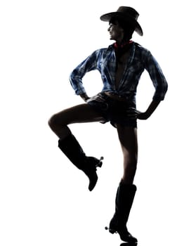 one woman cowgirl  dancer happy dancing country music in studio isolated on white background