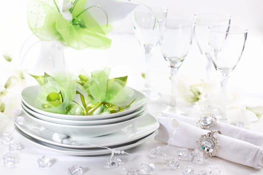 Luxury place setting for wedding in white and green tone