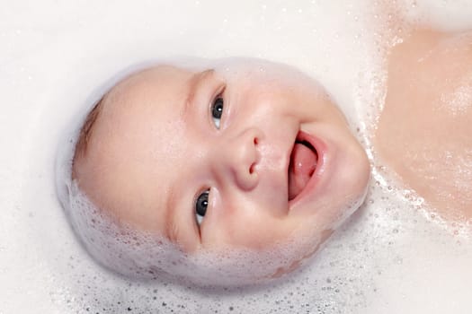 bath and newborn with foam