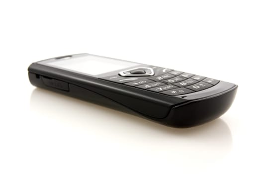 black mobile phone with reflection on white background