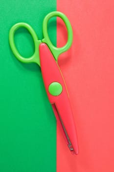 creativity concept. Colorful paper with child&#039 s scissors