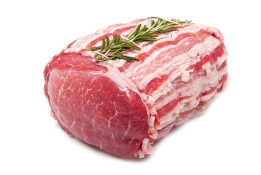 raw meat with rosemary