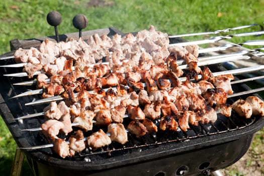 fresh meat prepared on a grill, outdor